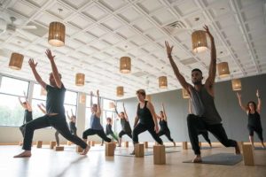 Honor Yoga group yoga session to stay healthy and active