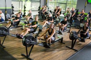 Eat the Frog Fitness group cardio rowing session to stay active.